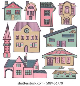 Set of houses. Hand drawn vector illustration. Collection of buildings in doodle style isolated on white background.