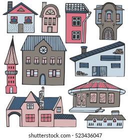 Set of houses. Hand drawn vector illustration. Collection of buildings in doodle style isolated on white background.