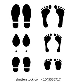 Set of human footprints. Man, woman and child shod and barefoot traces