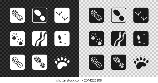 Set Human footprints shoes, Dove paw, Bear, Paw and Snake icon. Vector