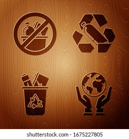 Set Human hands holding Earth globe, No trash, Recycle bin with recycle symbol and Recycling plastic bottle on wooden background. Vector