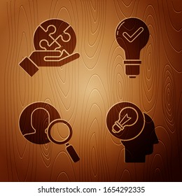 Set Human head with lamp bulb, Piece of puzzle in hand, Magnifying glass for search a people and Light bulb and check mark on wooden background. Vector