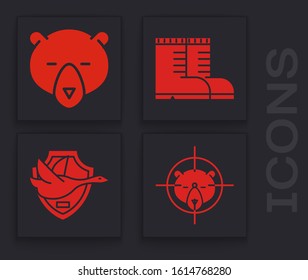Set Hunt on bear with crosshairs, Bear head, Hunter boots and Flying duck on shield icon. Vector