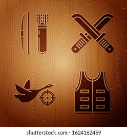 Set Hunting jacket, Bow and arrow in quiver, Hunt on duck with crosshairs and Crossed hunter knife on wooden background. Vector