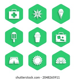 Set Ice cream in waffle cone, Sun, Scallop sea shell, Suitcase, Swimming trunks,  and First aid kit icon. Vector
