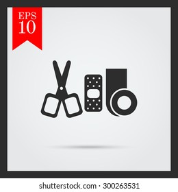 Set of icons with bandaging materials and scissors, with text on green ribbon