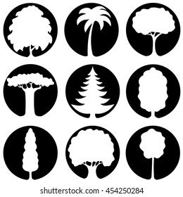 Set of icons of different types of white silhouettes of trees on a black background