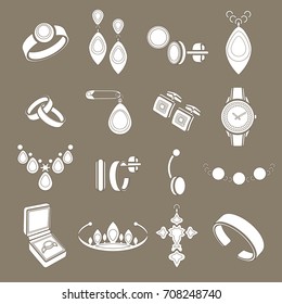 Set icons jewelry in vector. White drawn flat icons isolated on gray-brown background