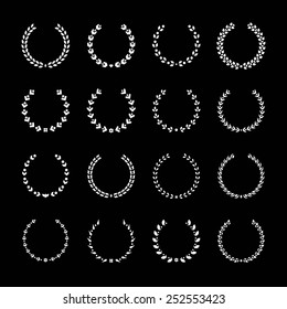 Set Icons Of Laurel Wreath And Modern Frames Isolated On Black. Vector Illustration