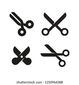 Set of icons or signs of scissors in different styles