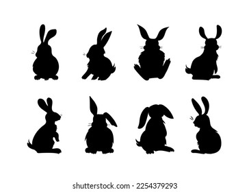 Set of illustrations of fluffy rabbits, hares. Bunnies in various poses. Hand-drawn silhouettes with black color fill. Artistic symbolic clip art made in simple lines, for prints