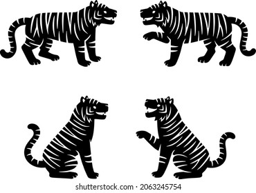 A set of illustrations of paper cutting style silhouettes of standing and sitting tigers
