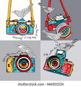 Set of image bright color cameras and bird in the folk style. Vector illustration.