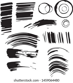 Set of imprints of ink. Black prints, strokes, stains on an isolated white background