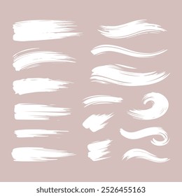 Set of Ink brush stroke silhouettes in various shapes and sizes
