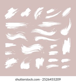 Set of Ink brush stroke silhouettes in various shapes and sizes
