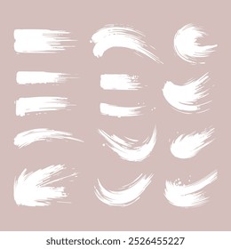 Set of Ink brush stroke silhouettes in various shapes and sizes