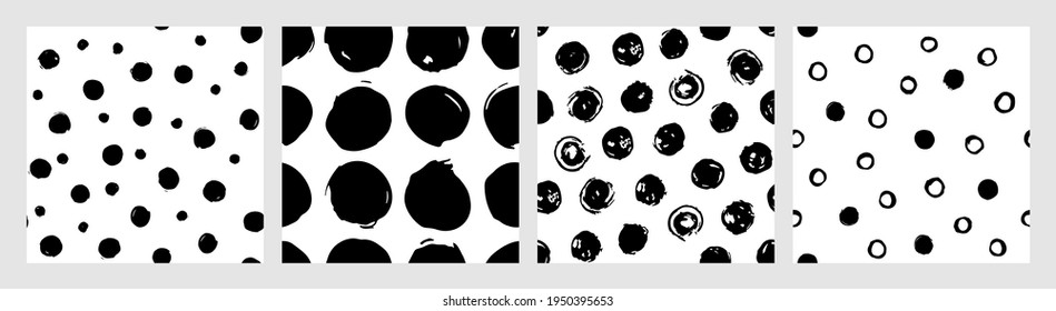 Set of ink dots vector seamless patterns. Hand drawn brush polka dots backdrop. Doodle illustration for wrapping paper and fabric. Contemporary monochrome collection with polka dots patterns