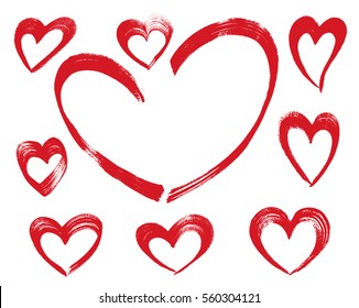 Set of ink hand drawn heart shapes made of brush strokes. Red sketch isolated on white background. For decorate, Valentine cards, greetings and invitations.