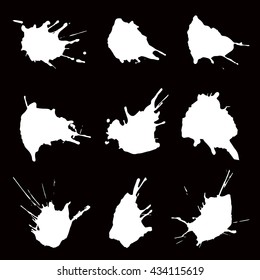 Set of ink spots on black background vector illustration