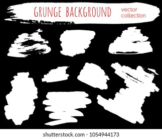 Set of ink vector stains. Grunge brush collection isolated on black