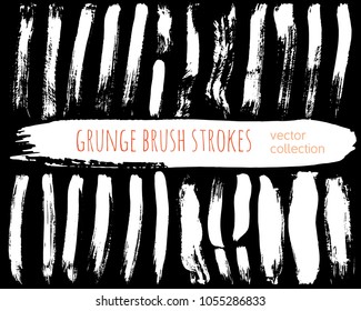 Set of ink vector stains. Grunge brush collection isolated on black