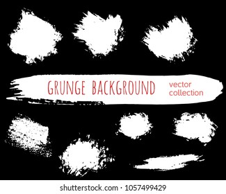 Set of ink vector stains. Grunge brush collection isolated on black