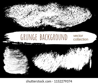 Set of ink vector stains. Grunge brush collection isolated on black
