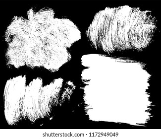 Set of ink vector stains. Grunge brush collection isolated on black