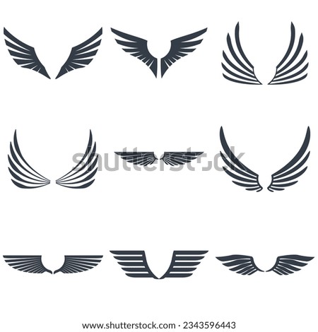 Set of inked modern wings icons and emblems for logos, coat of arms signs or other graphic or printing materials. Two sides set of wings