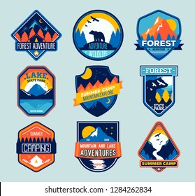 Set of isolated badges with mountain peaks and forest camp. Outdoor adventure emblems, badges and logo patches. Forest camp labels in vintage style. Mountain tourism, hiking. 