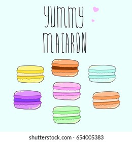 Set of isolated colorful doodle macaroon with hand written letters.