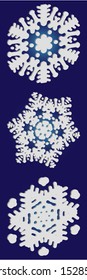 Set of isolated falling snowflakes on blue background.  Vector illustration frames. Colorful concept accurate forms and colors. White xmas paper craft 3d ornaments for banners, greeting cards.