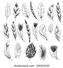 Set of isolated hand drawn vector feathers on white background. Vintage boho decorative collection drawn with pen and ink