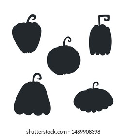 Set of isolated hand-drawn disjunct black pumpkin silhouettes on white background. Collection of Halloween traditional symbol vegetables with different shapes. Pack of wall decals and stickers