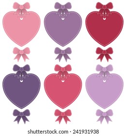 set of isolated heart shaped labels and stitched ribbon bows, with copy space