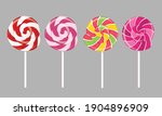 A set of isolated multi-colored lollipops with a spiral pattern. Vector flat illustration.