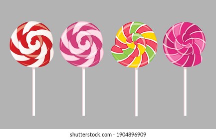 A set of isolated multi-colored lollipops with a spiral pattern. Vector flat illustration.