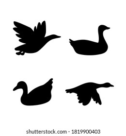 Set of isolated on white background waterfowls. Abstract black silhouettes of flying wild migratory birds - duck, geese, dove for icons, logos or printing on any surface.