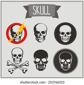 Set of isolated skulls on gray background.