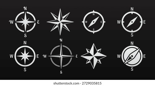 set of isolated white icons on a theme compass