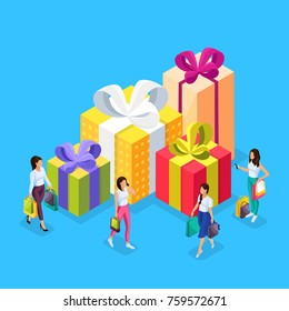 A Set Of Isometric People Are Engaged In Festive Shopping. Gifts In Colored Boxes With Bright Bows. Girls Buy Gifts With Packages. Vector Illustration.