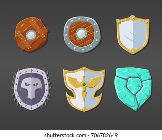 Set of items for game. Collection of decoration shields for games. Set of medieval cartoon shields. Vector illustration.