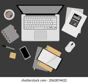 Eine Reihe von Artikeln für das Büro oder Arbeit zu Hause. Ein Desktop mit Laptop, Telefon, Taschenrechner und Bürobedarf.