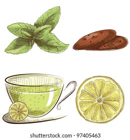 Set of items related to a tea ceremony - mint, chocolate cookies, lemon