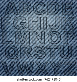 Set of jeans letters on blue denim background.
