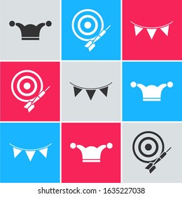 Set Jester hat with bells, Classic dart board and arrow and Carnival garland with flags icon. Vector