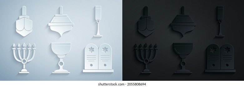 Set Jewish goblet, Hanukkah menorah, Tombstone with star of david, dreidel and  icon. Vector