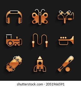 Ponga cuerda para saltar, juguete para barcos de cohete, bate de béisbol con bola, trompeta, skateboard, tren de juguetes, Slingshot y icono de auriculares. Vector