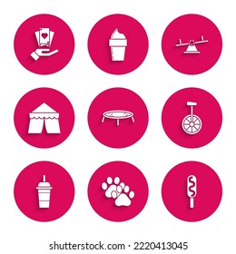 Set Jumping trampoline, Paw print, Corn dog, Unicycle one wheel bicycle, Paper glass with drinking straw and water, Circus tent, Seesaw and Hand holding playing cards icon. Vector